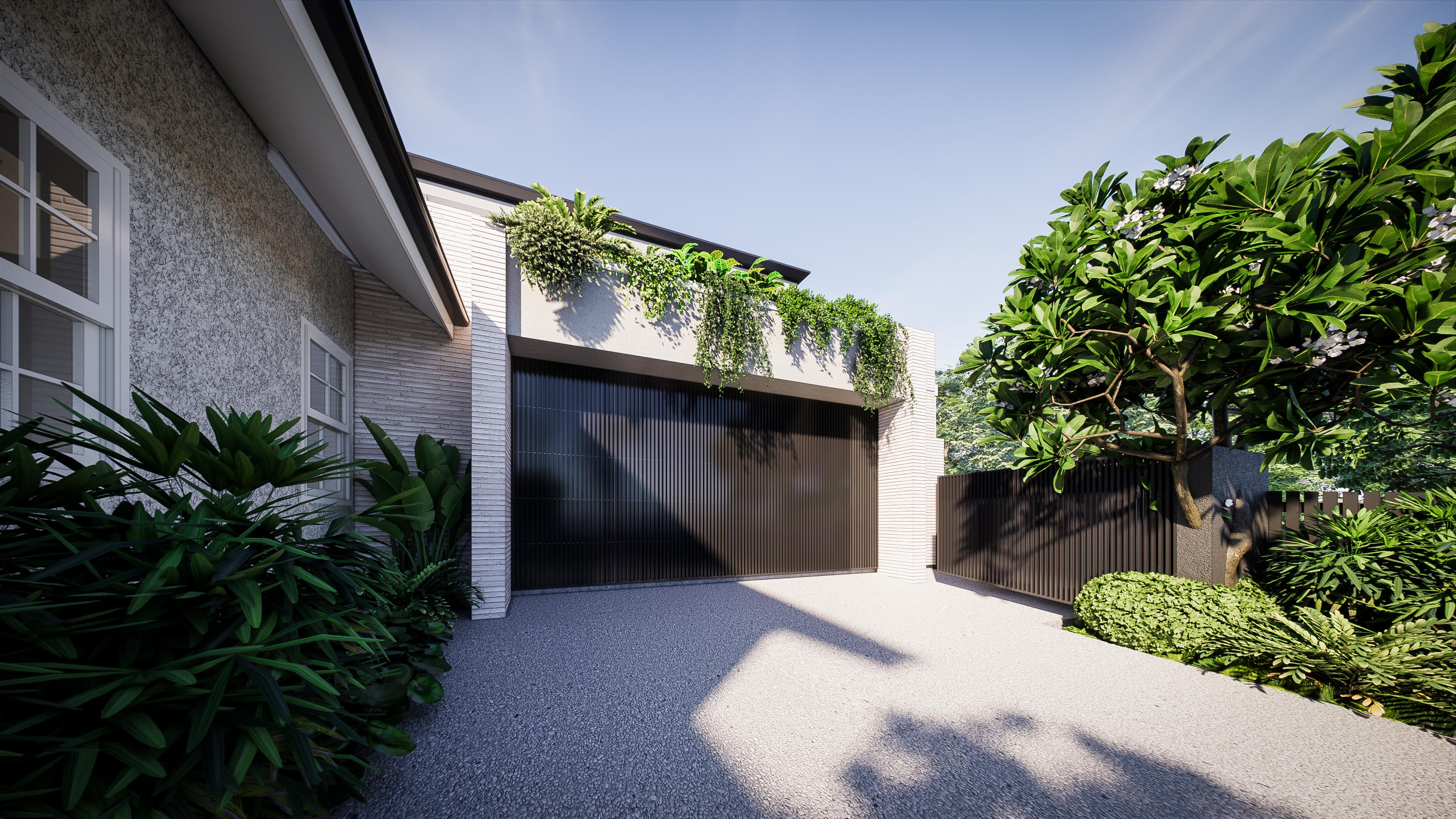 Gravel driveway to a dark battened double garage door topped with cascading greenery and flanked by frangipani planting
