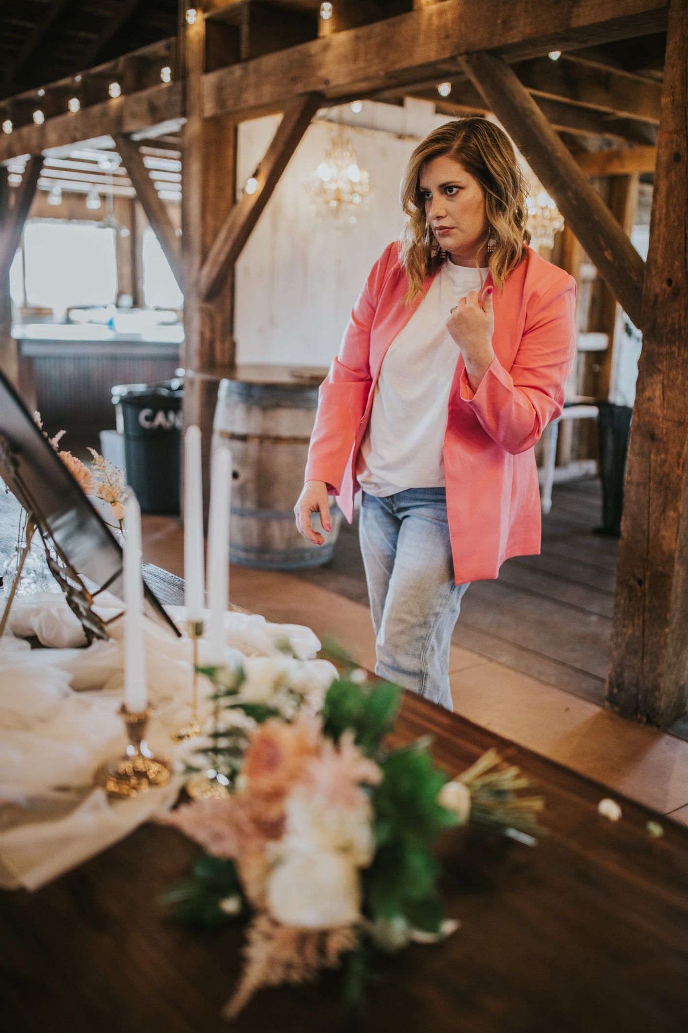 Kari walking through the barn during set-up