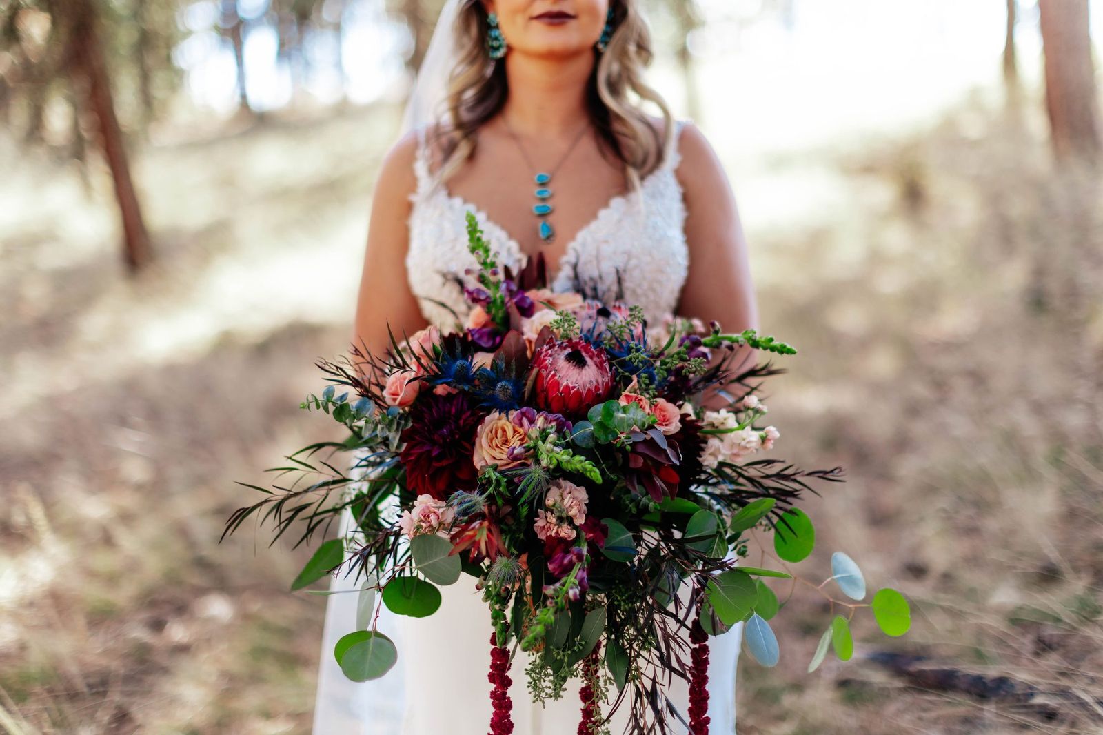 Bridal bouquet with protea and eucalyptus