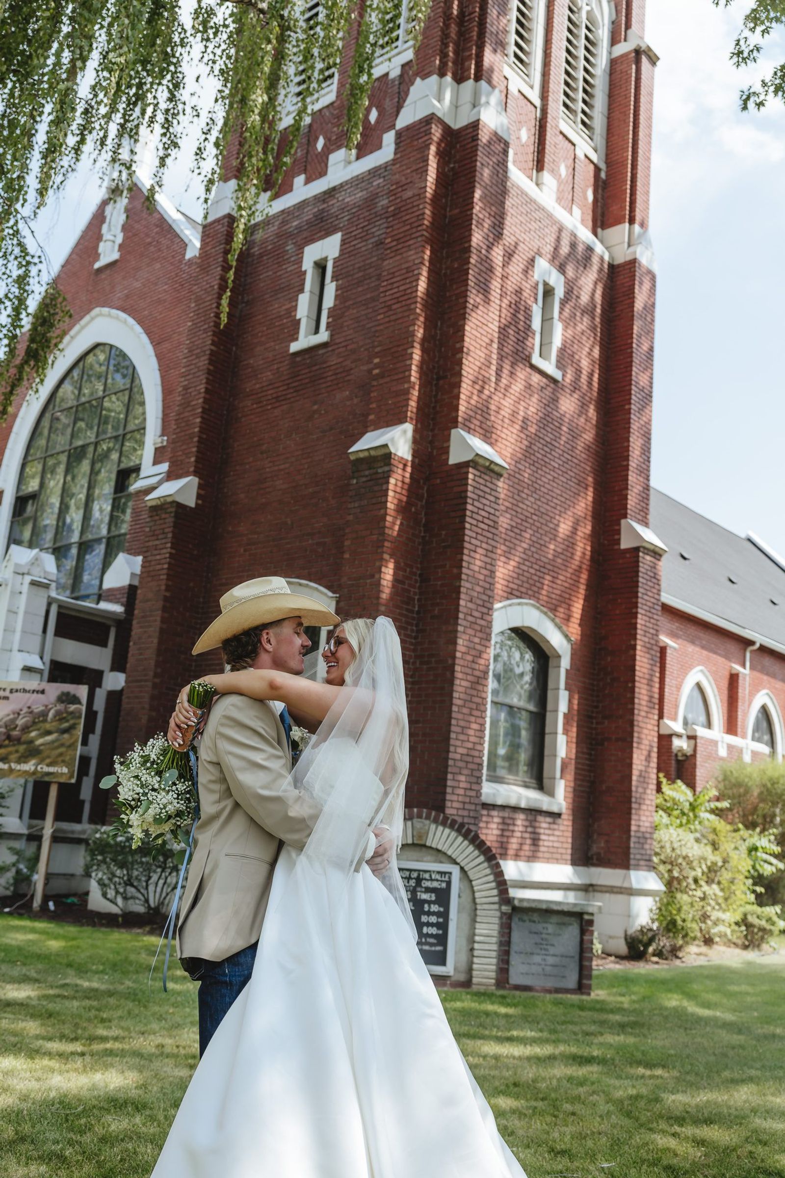 Couple outside the brick church