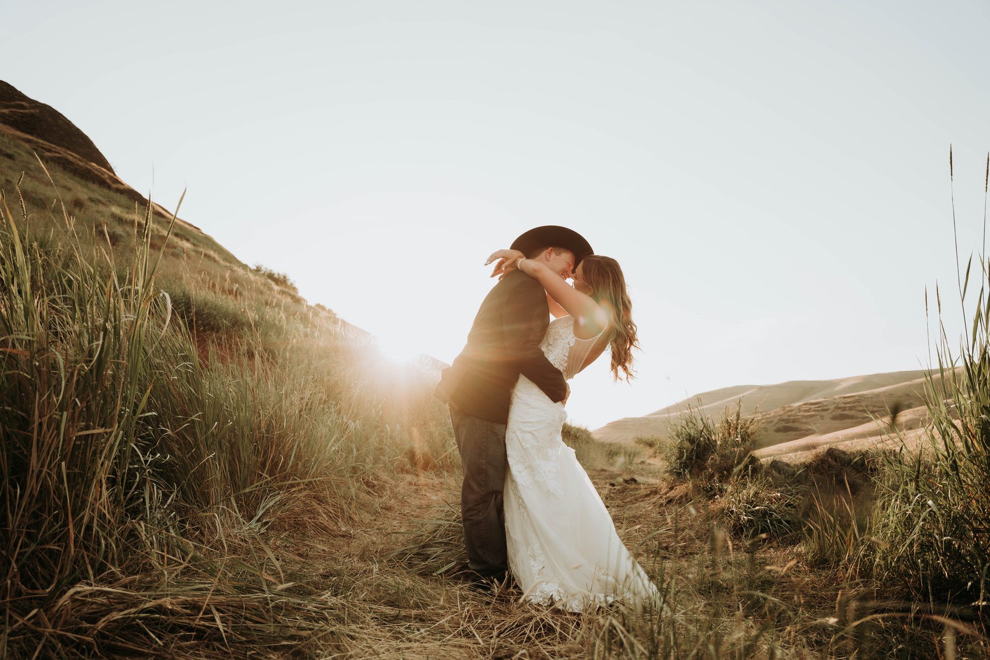 Couple embracing at sunset