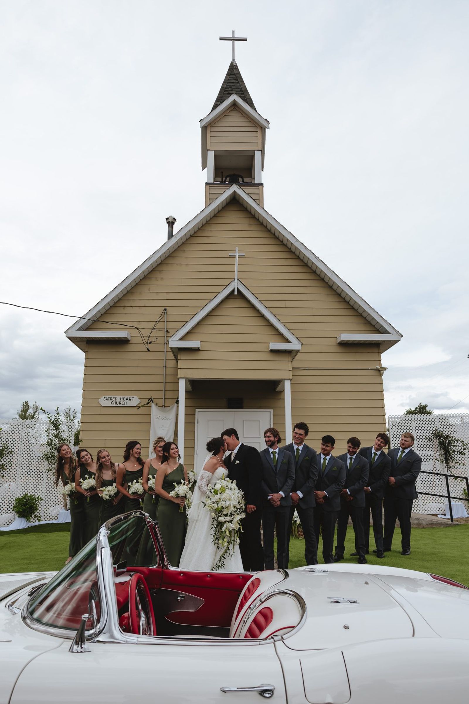 Wedding party gathered outside the chapel