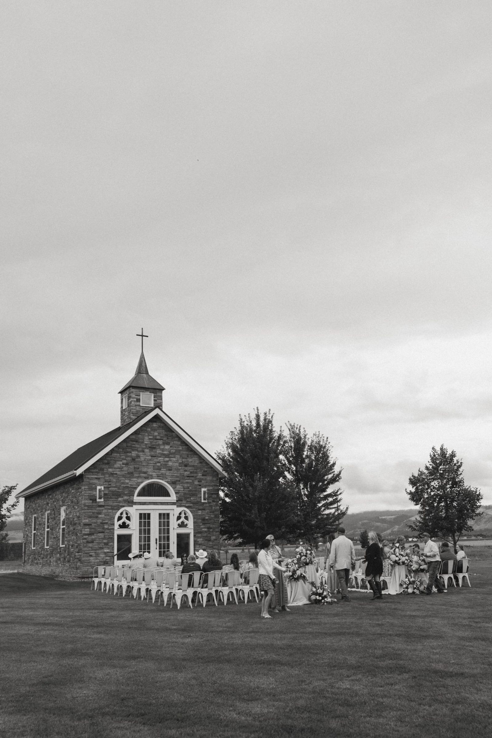 Black and white wide shot of the chapel ceremony
