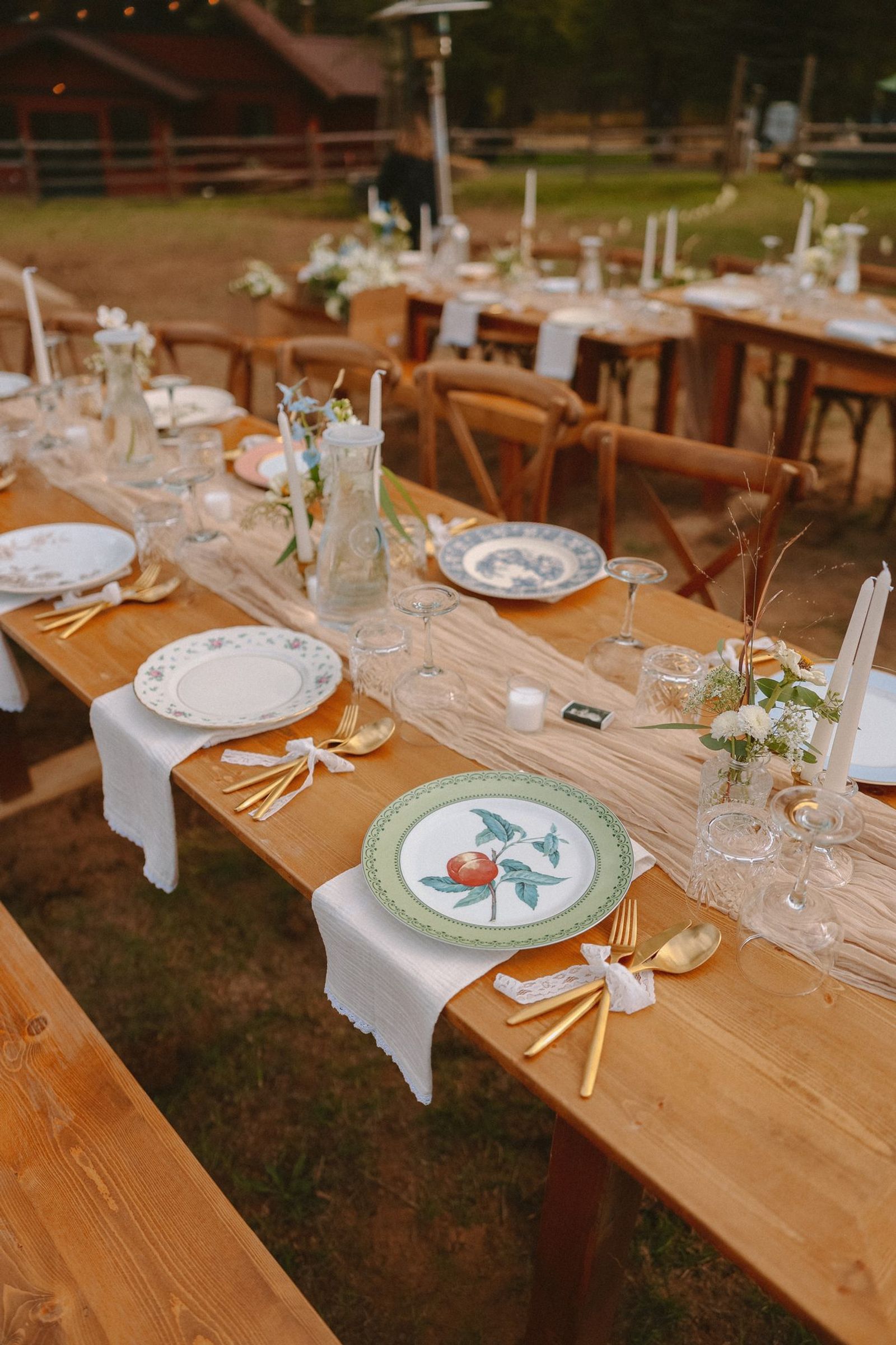 Long table set with place settings and candles