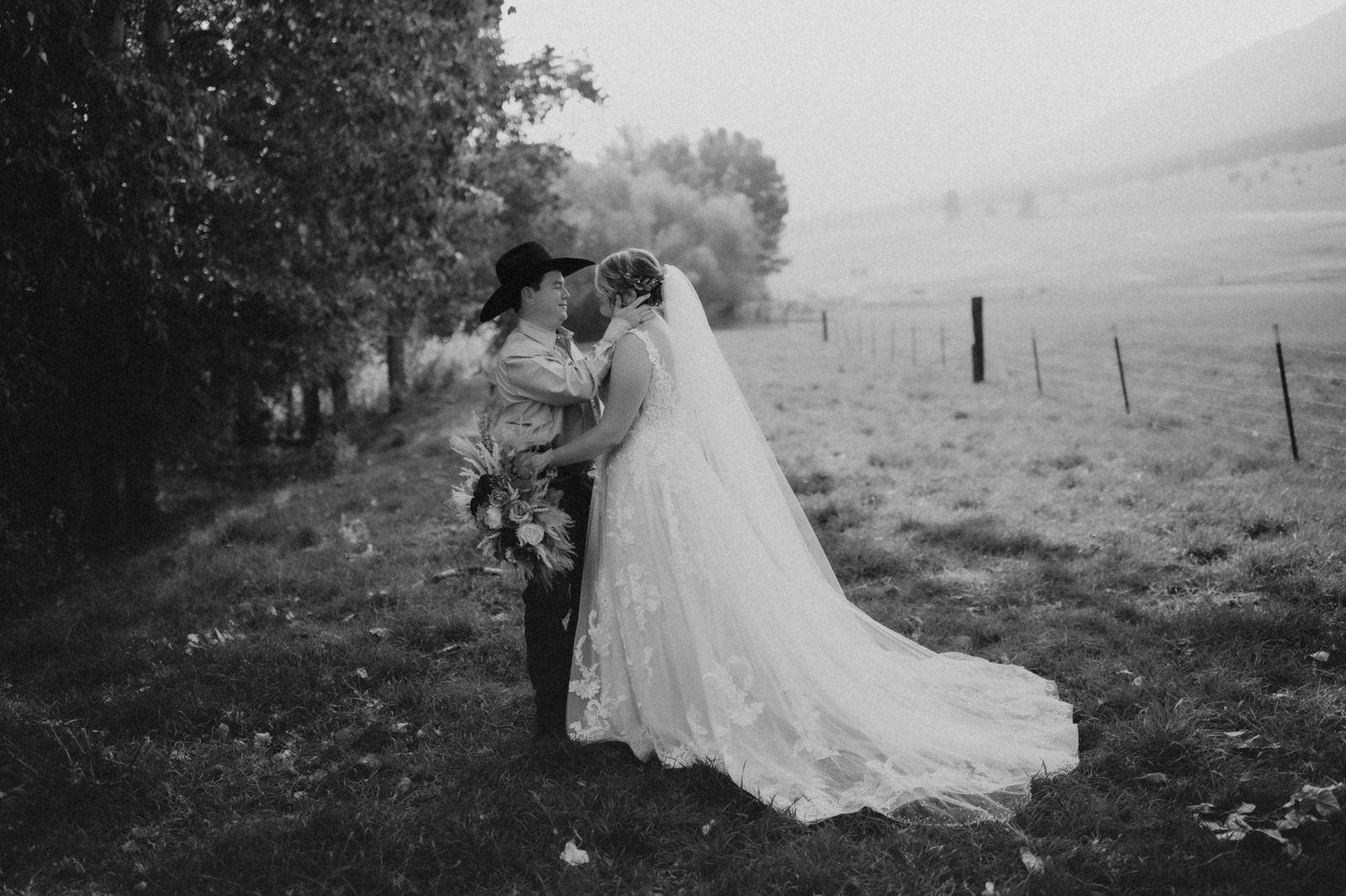Black and white portrait in a foggy field