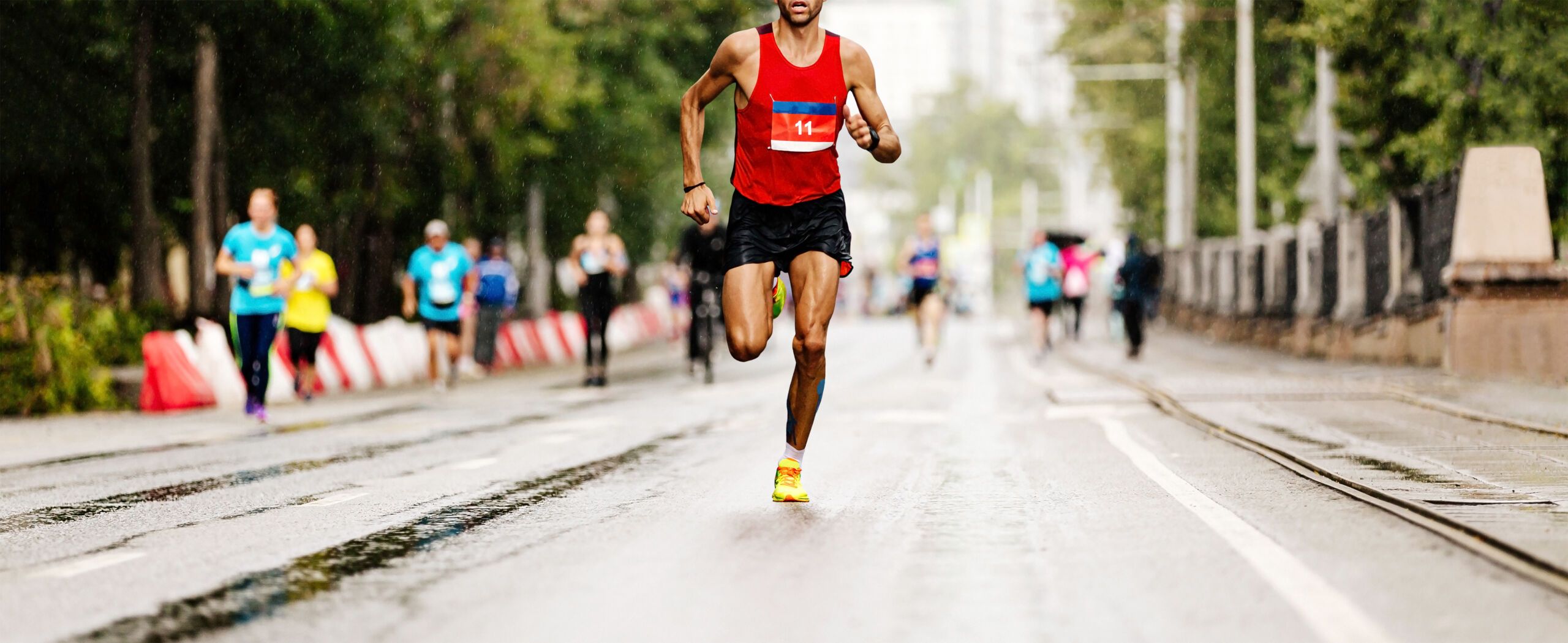 Runner lacing up trainers before a long run