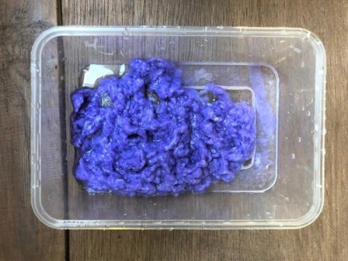 tissue paper soaking in a container of water