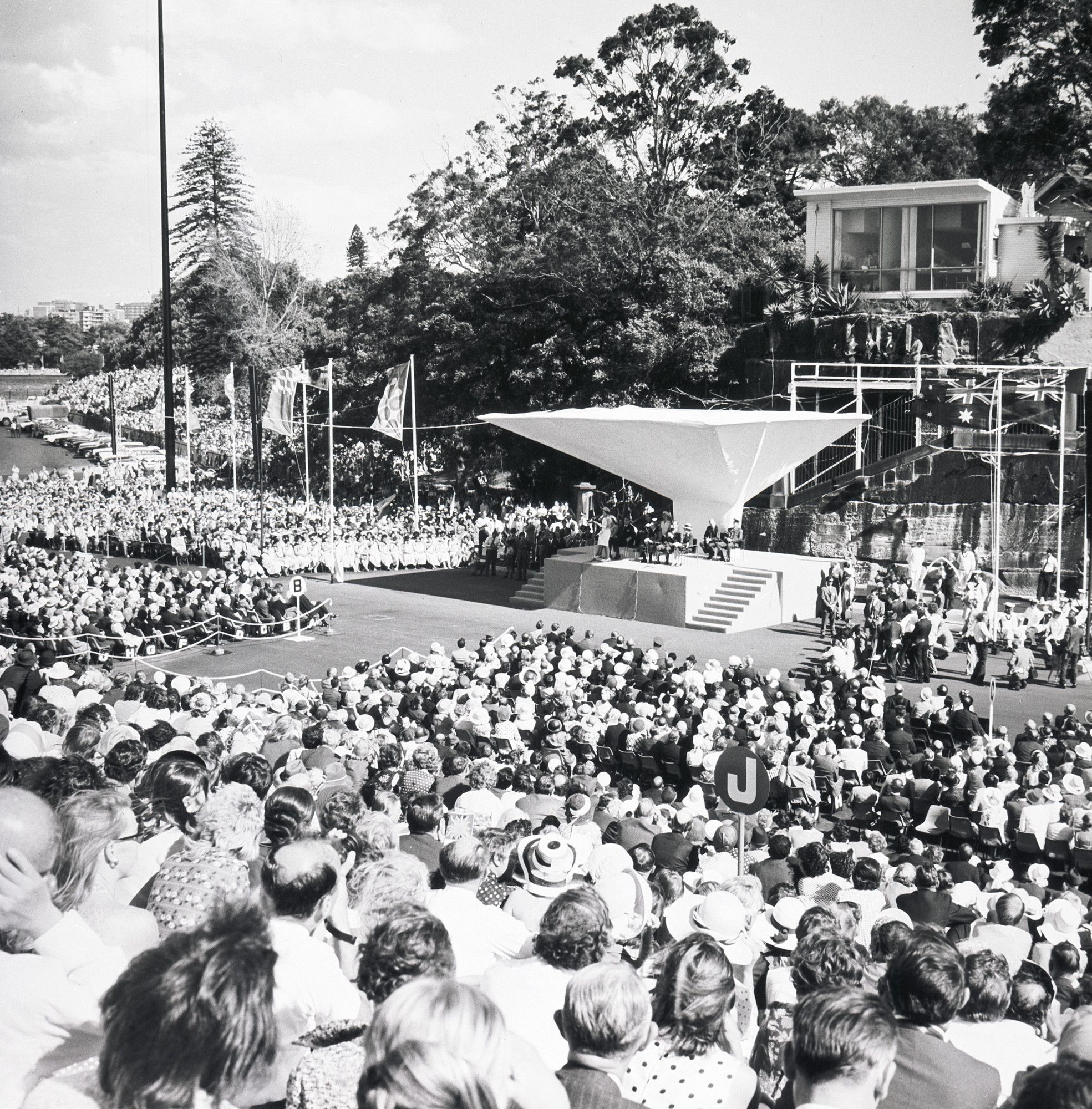 Her Majesty the Queen delivering her speech at the opening of the Opera House from a podium constructed in the forecourt in 1973