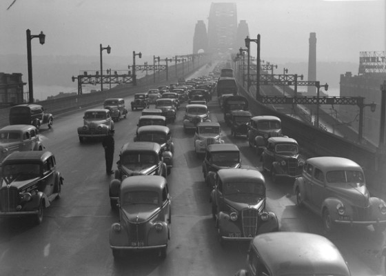 1947 photo showing cars on driving along the Sydney Harbour Bridge