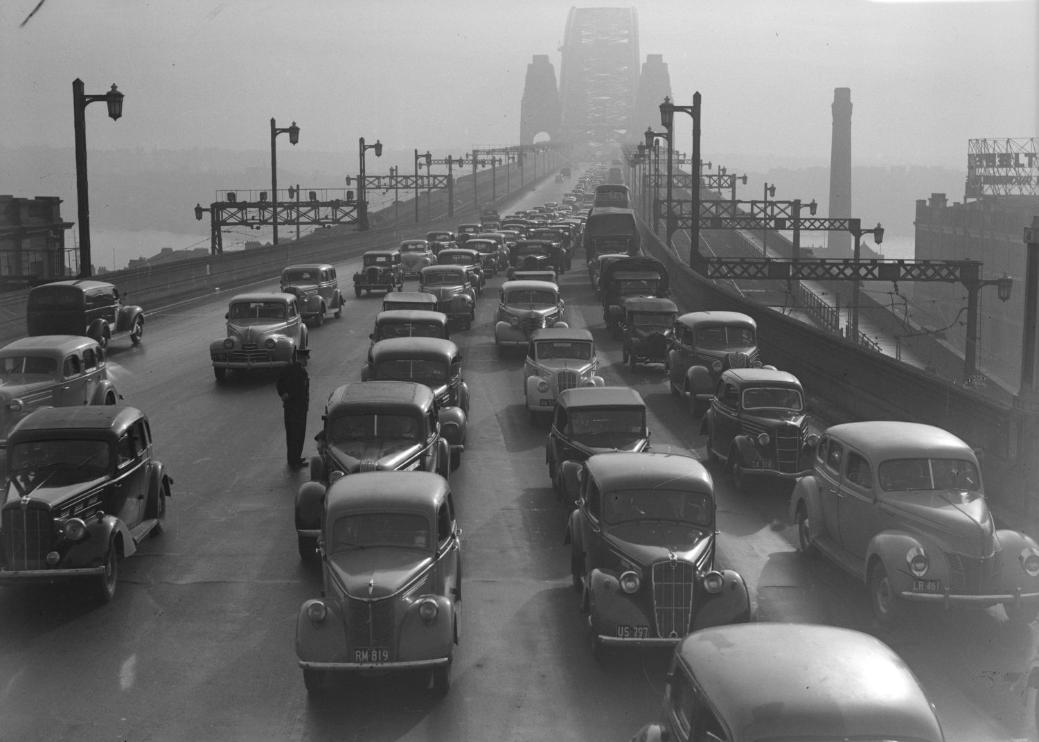 1947 photo showing cars on driving along the Sydney Harbour Bridge