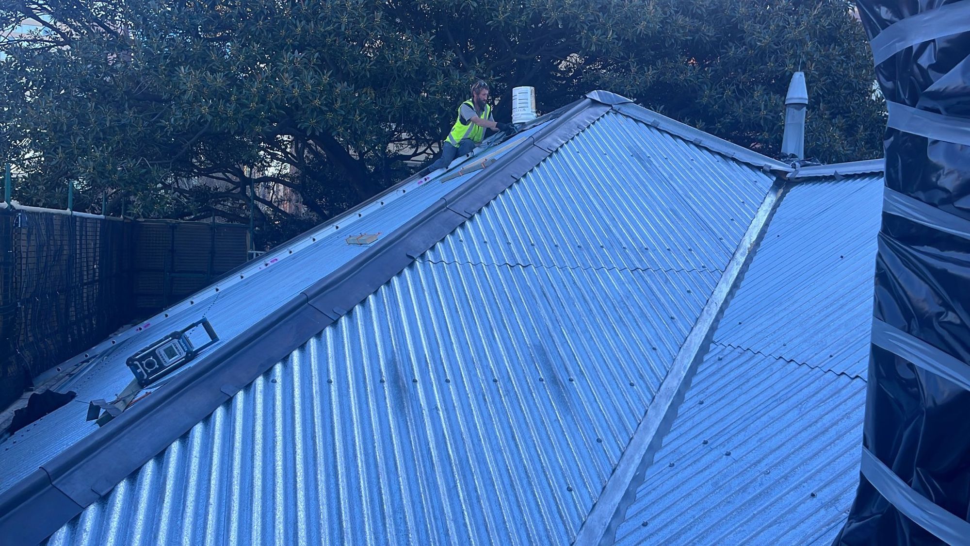 Installation of lead flashing on hips of roof