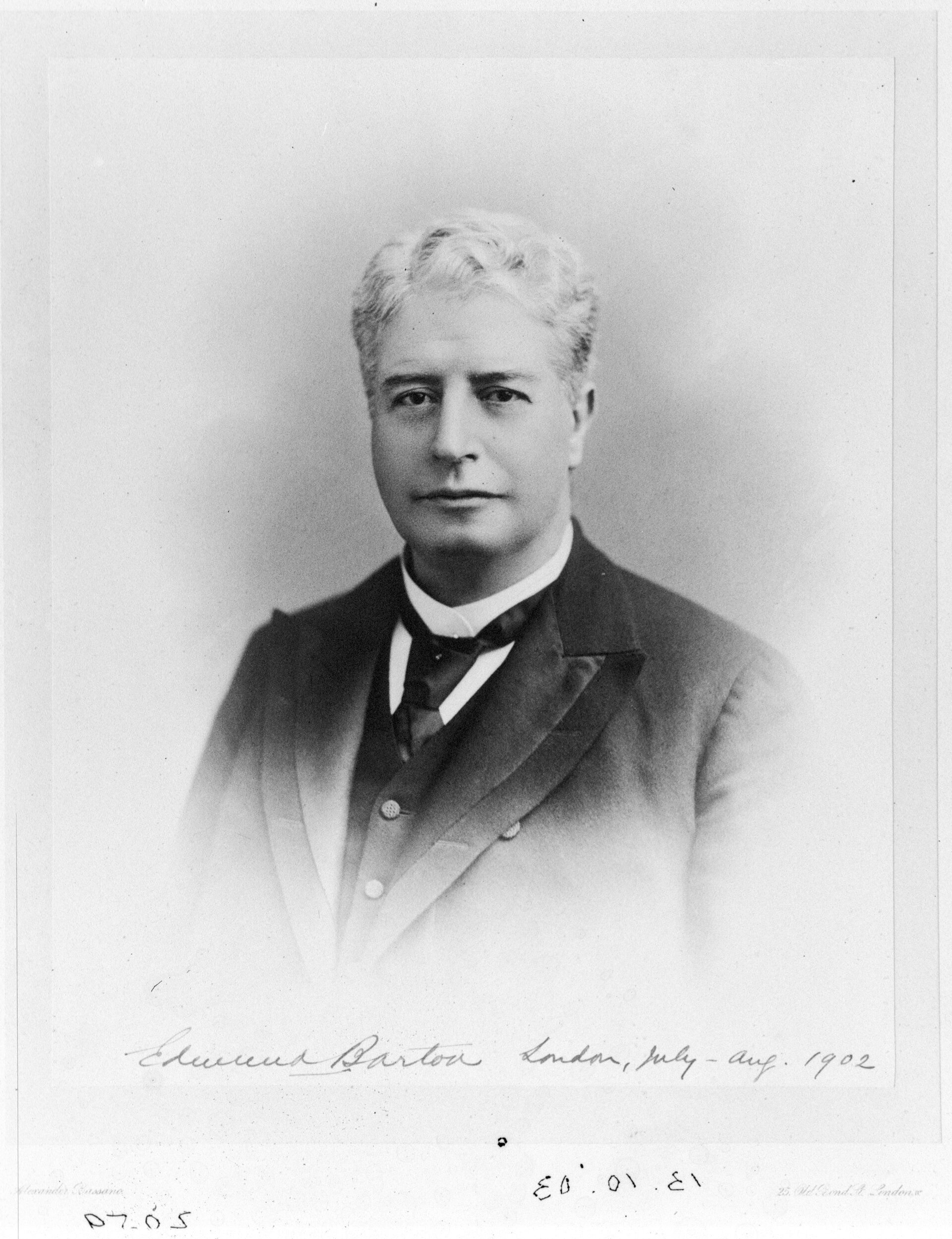 Portrait photo of a man in suit and tie
