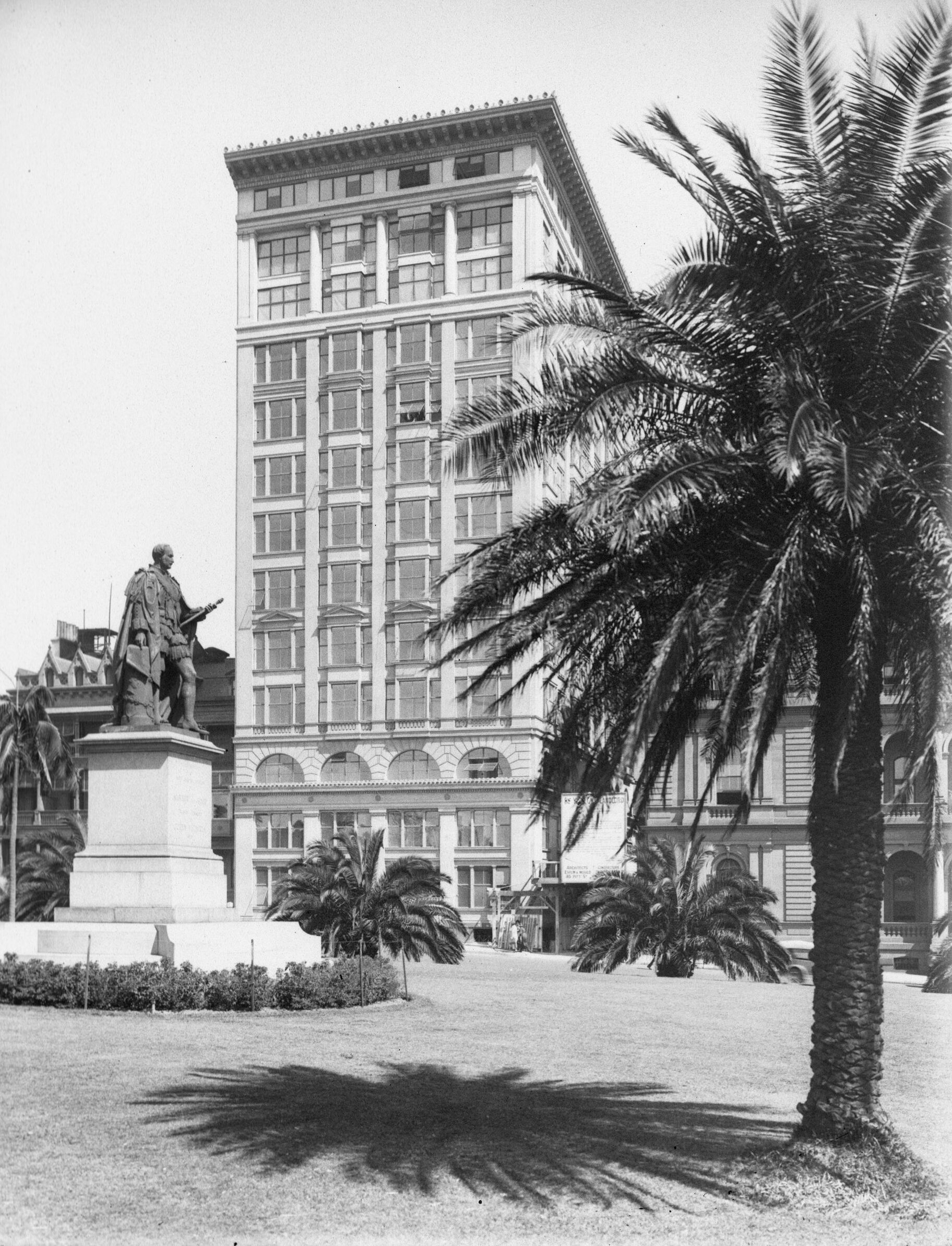 The Prince Consort’s statue with the Astor building in the background. Government Printing Office