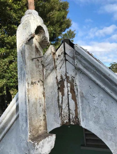 Detail of deteriorated finial base and bargeboard, Meroogal. 