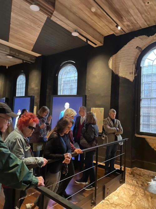 People browse an exhibition space