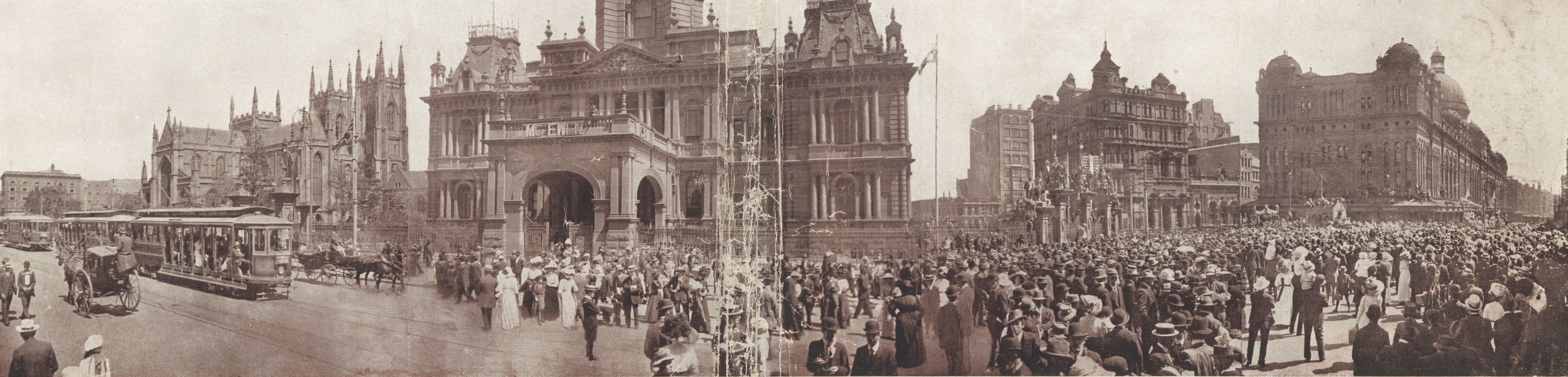 1915 Crowds in George Street pass St Andrews Cathedral at Sydney Town Hall