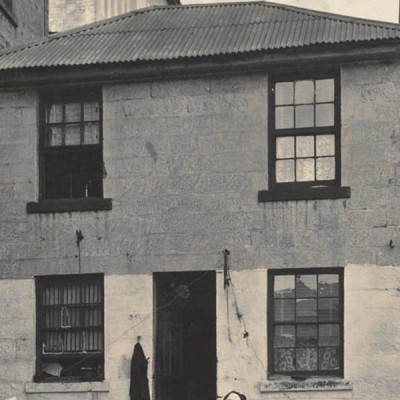 A sandstone two storey house
