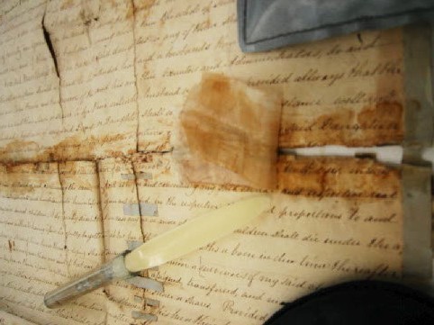  Removing old tape on a letter