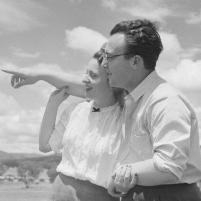 A couple looking towards the horizon