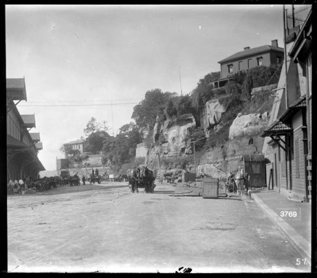 Black and white photo showing wharf, horses and drays, Cowper Wharf Road