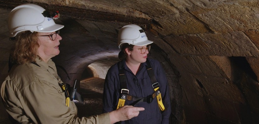 Two people inside the Tank Stream