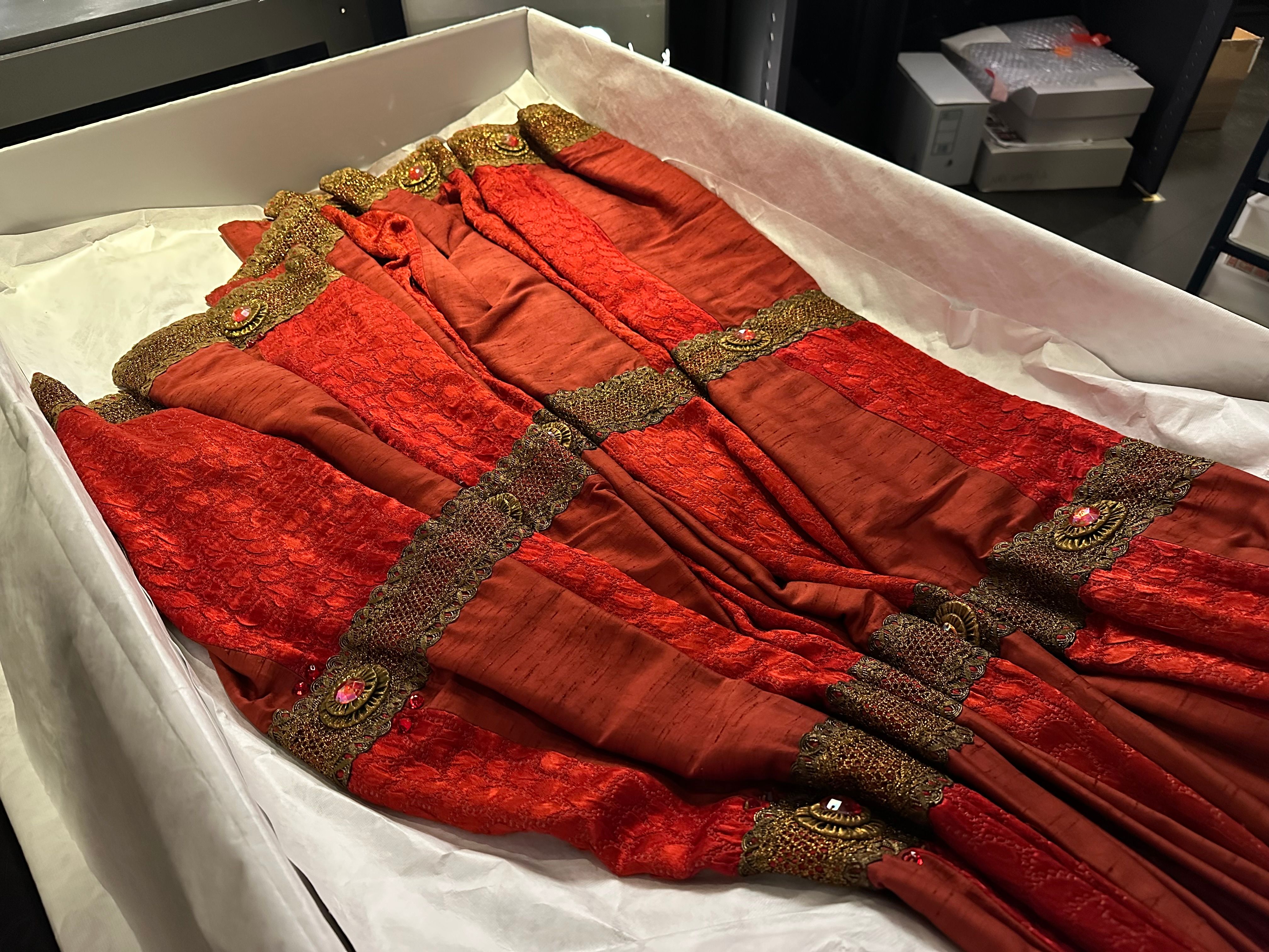The skirt of the dress being unpacked
