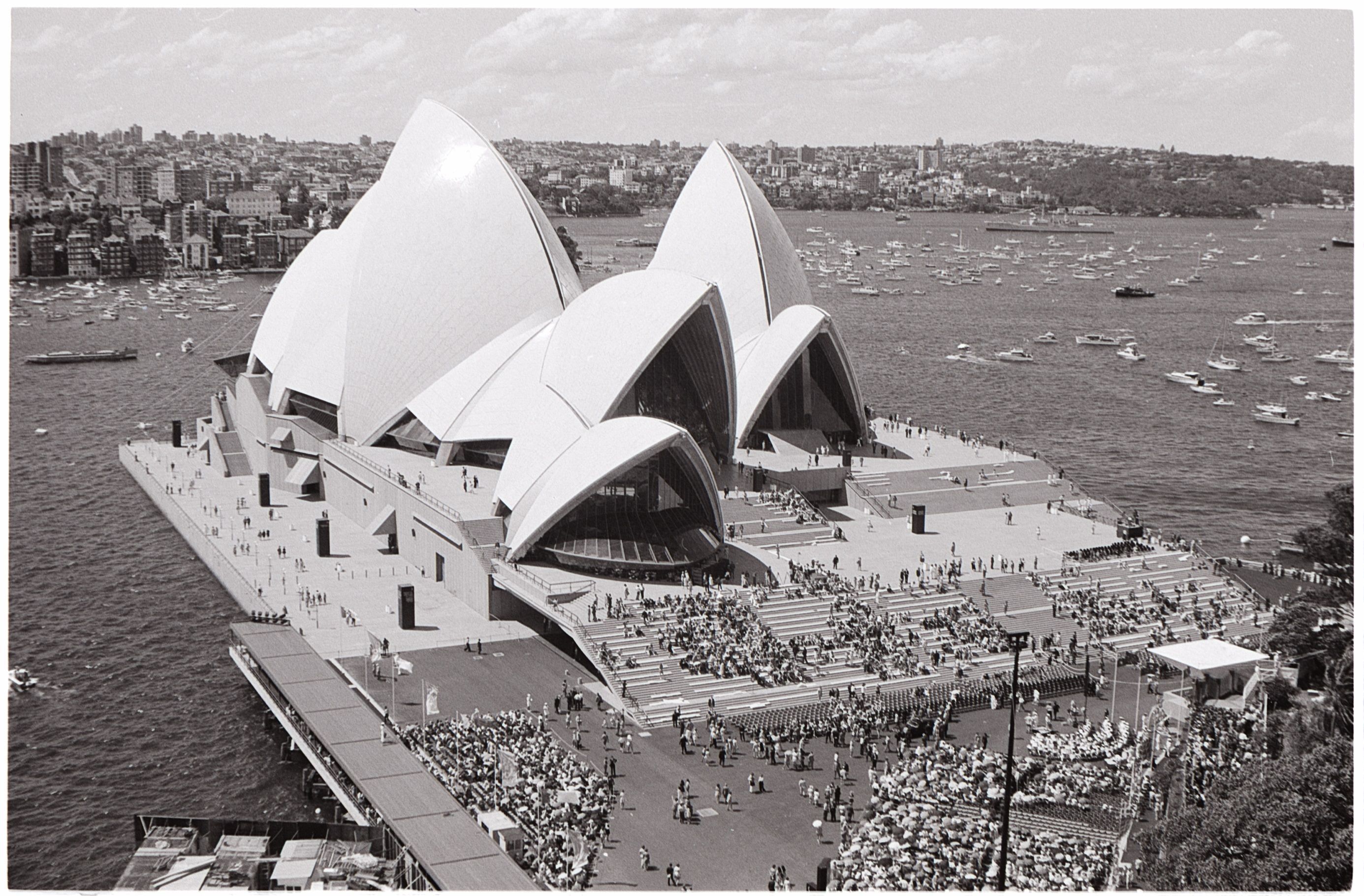 Crowds begin to take their places before the arrival of HM the Queen to open the Sydney Opera House, October 20, 1973