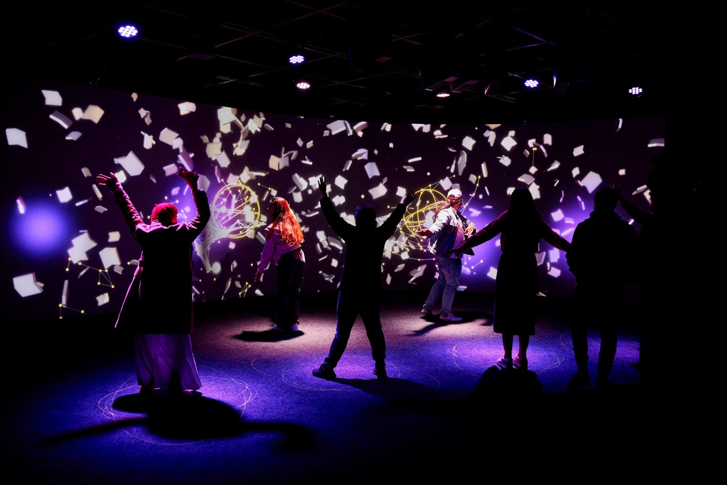 Visitors engaging with the exhibition The People’s House: Sydney Opera House at 50