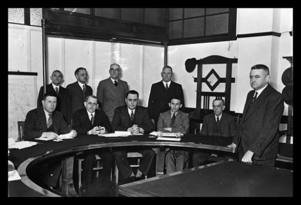 A group of men at an office meeting