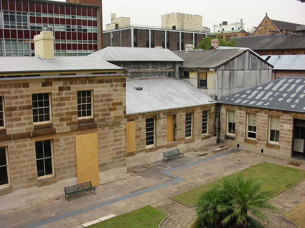 Form of the coining room roof and clerestory reinstated, the eastern office building under construction at rear and works to the courtyard commenced. February 2004