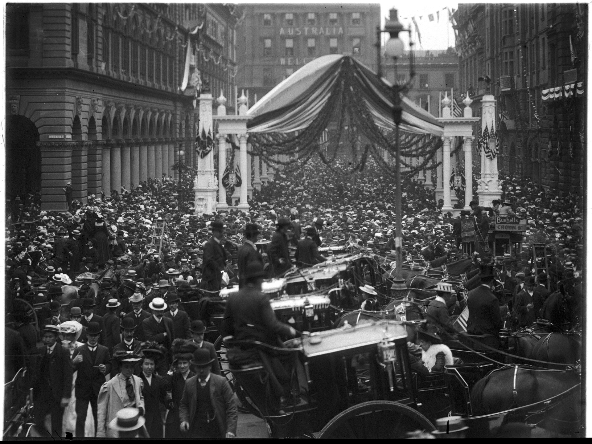 A large crowd of people fill the space of Martin Place 