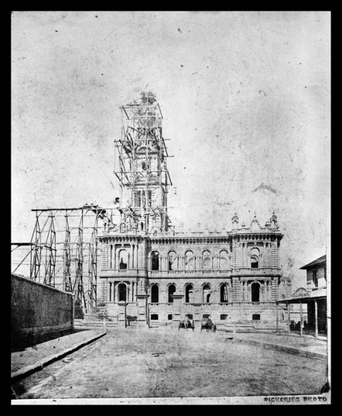 Scaffolding around a building showing construction in progress