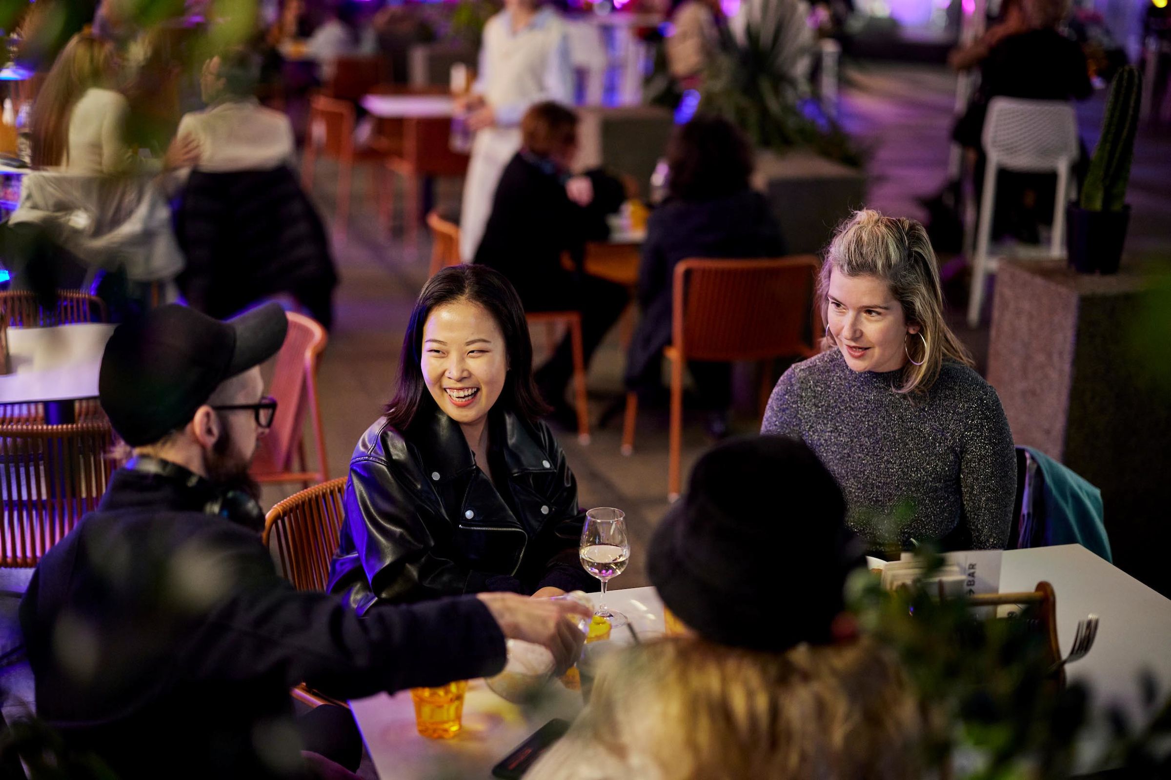 Friends chatting at the Museum of Sydney