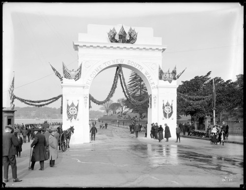 A decorated arch at a harbour 
