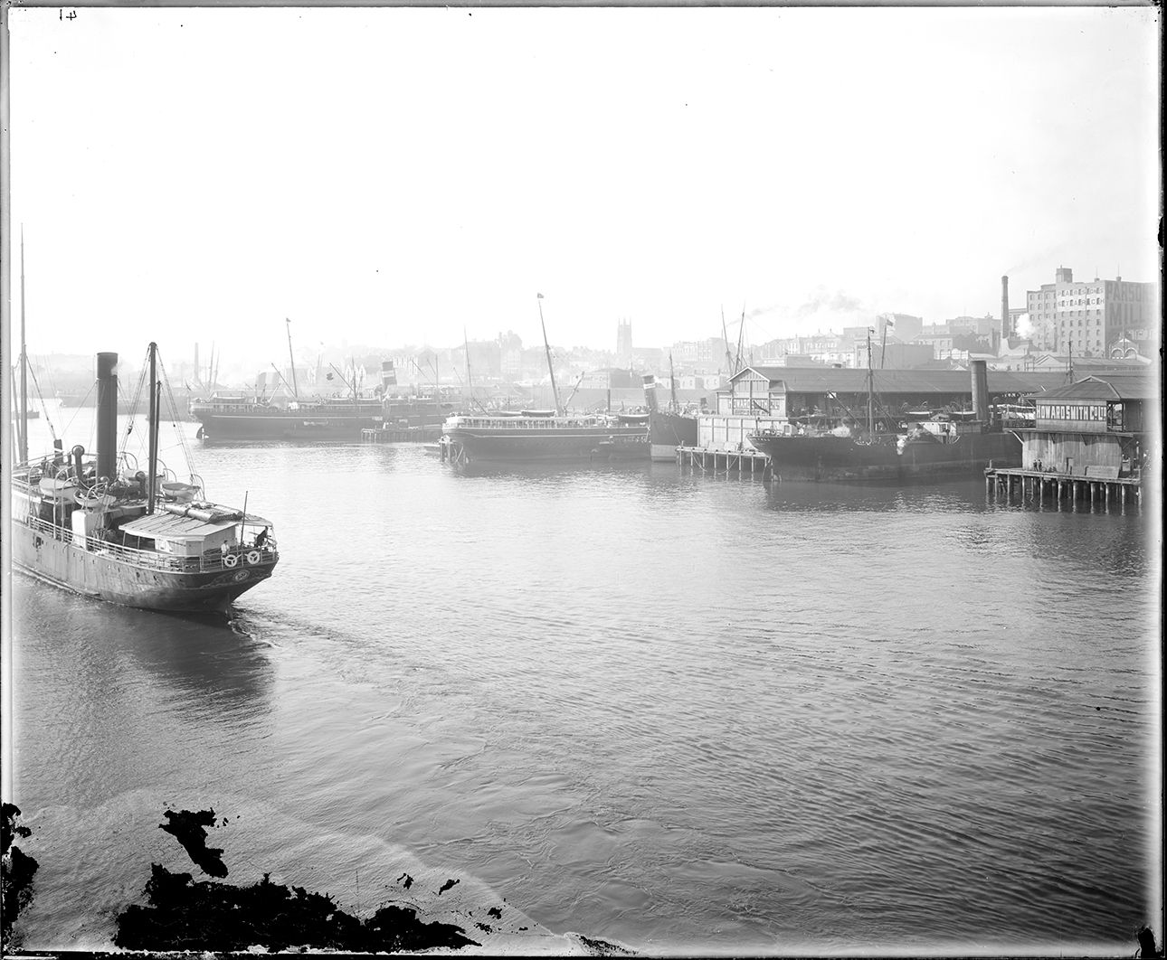 Ships docked at wharves in Darling Harbour