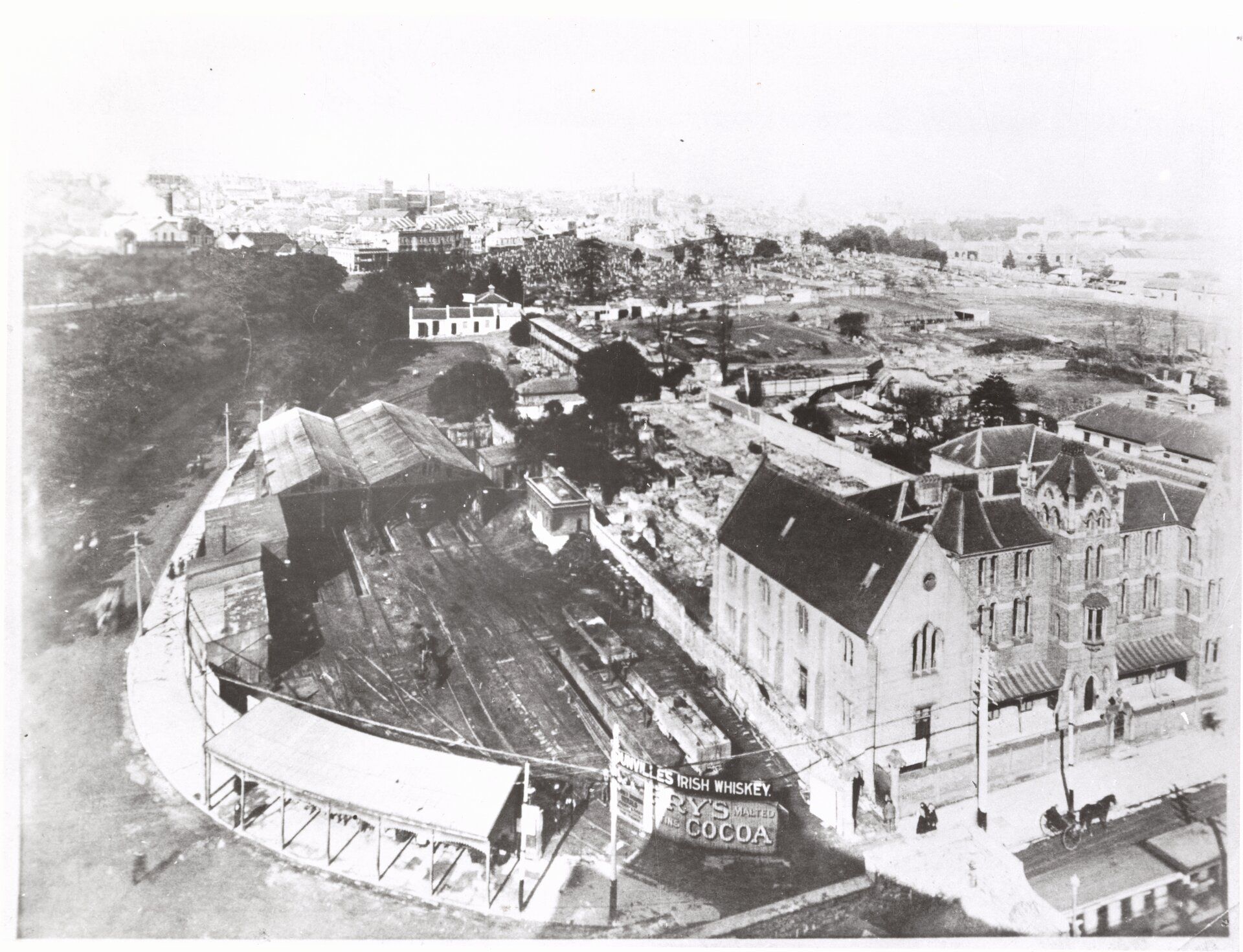 Tram depot with cemetery in the background