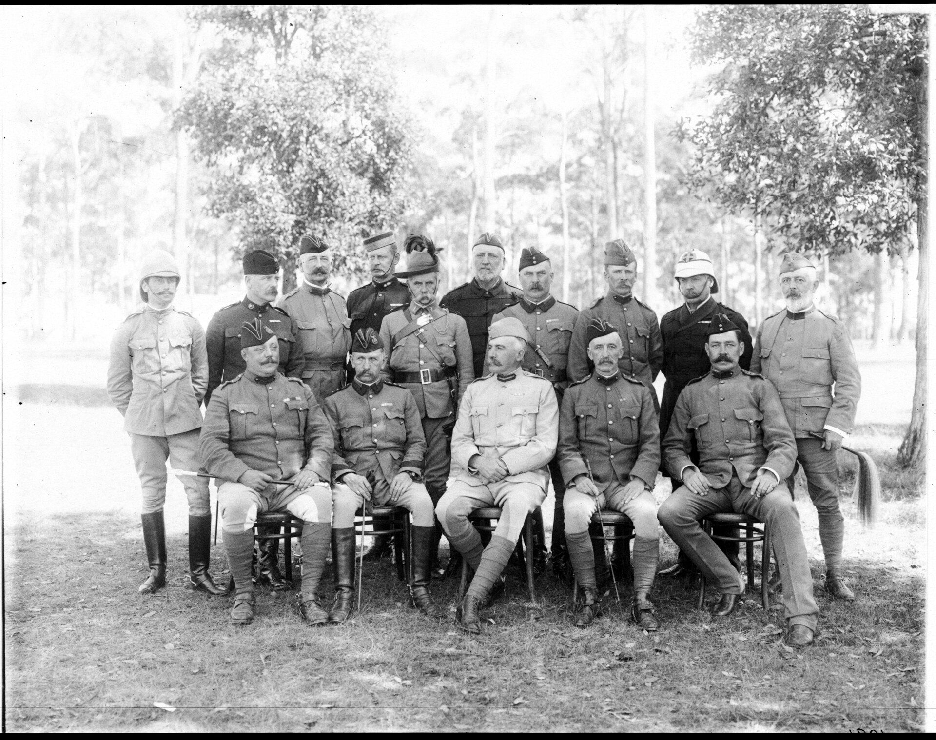 Group photo of military men in various military uniforms
