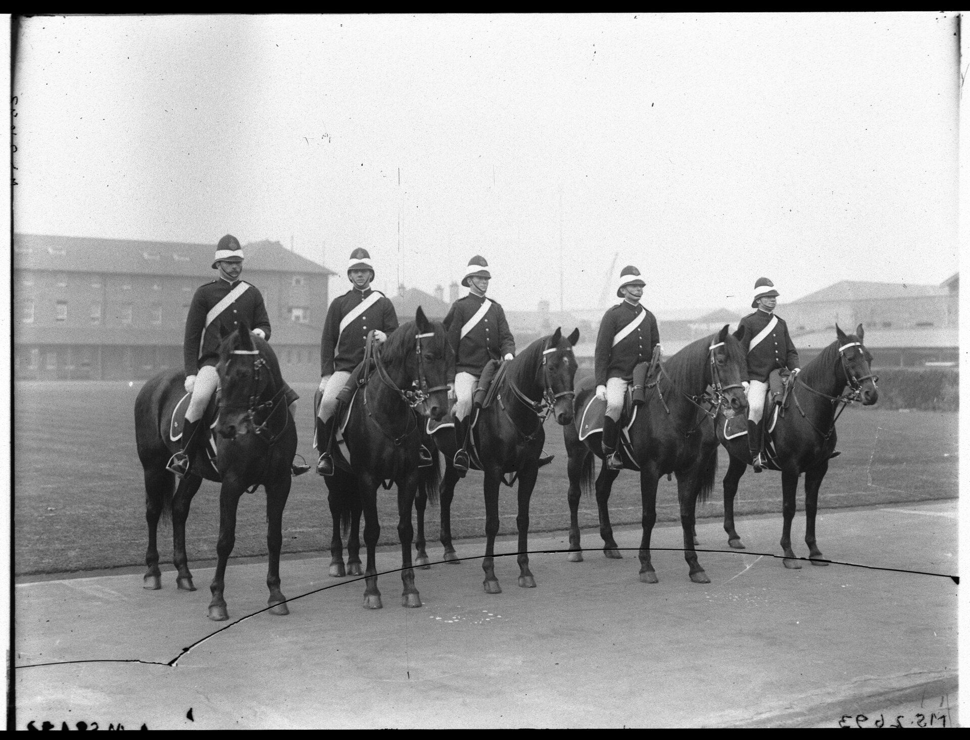 Five police men on horseback 