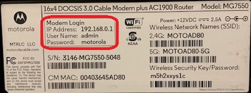 A photo of the back label of a Motorola cable modem, highlighting the modem login credentials, including IP address, username, and password, along with the wireless network name and security key.