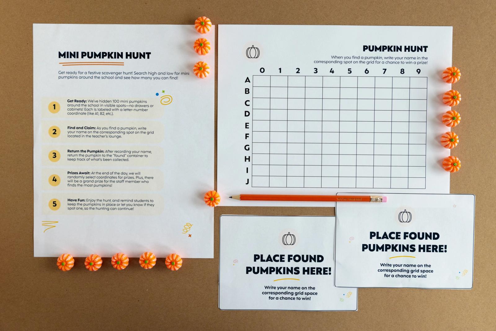 Pieces of paper lay on a brown background. Small pumpkins lay scattered around.