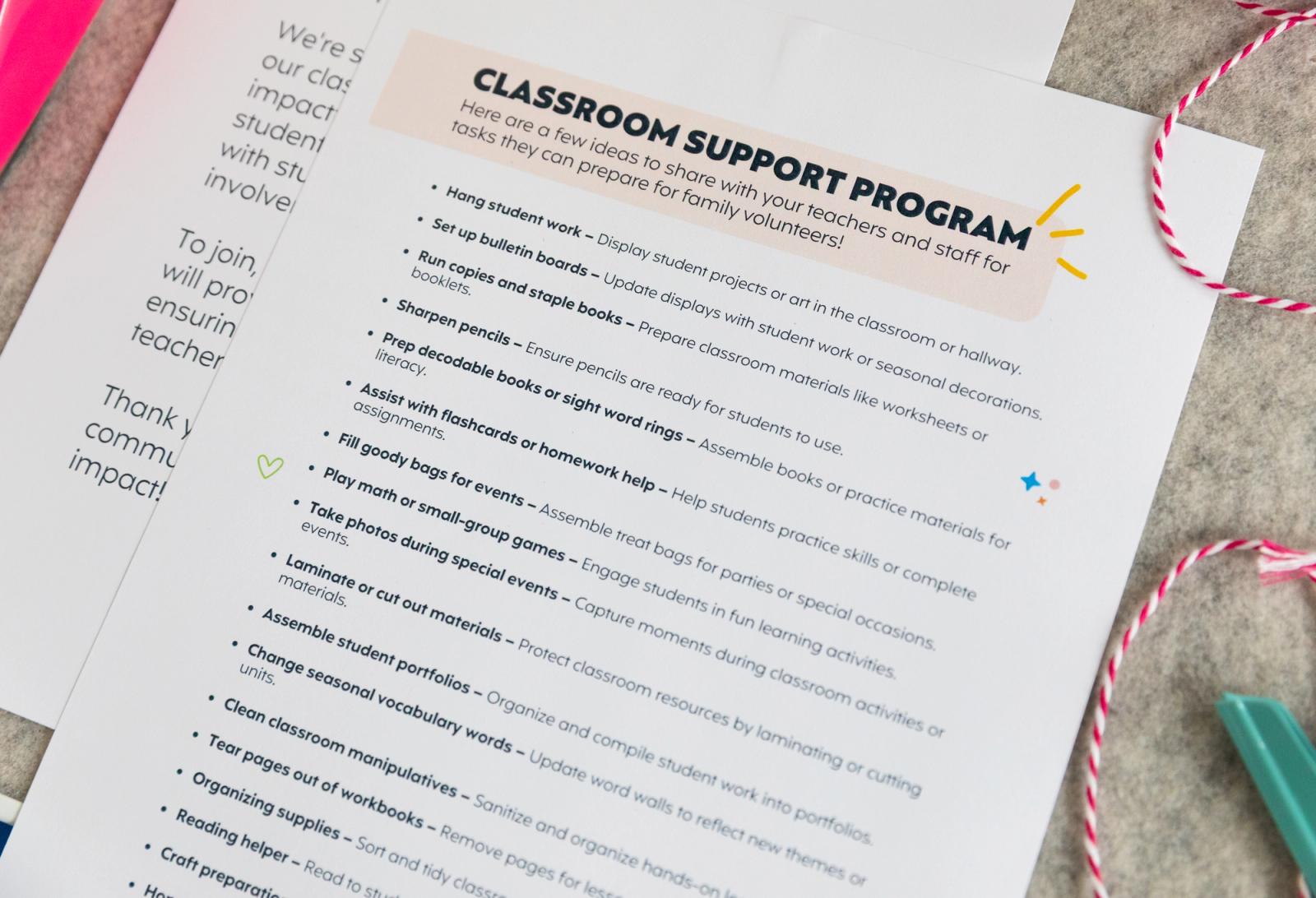 A sheet of paper that says "classroom support program" lays on a gray background.