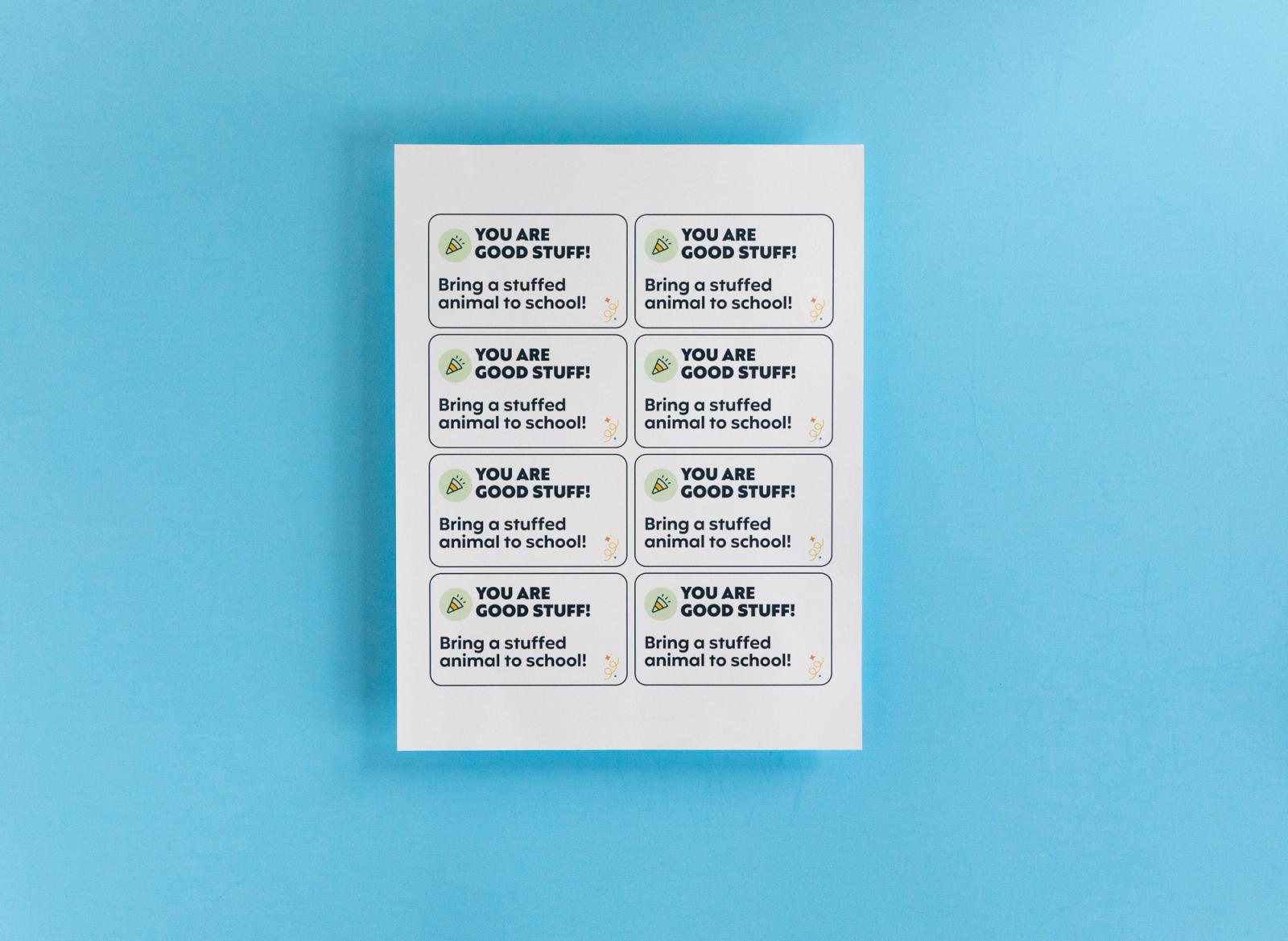 Sheet with coupons that say "you are good stuff" lays on a light blue background.