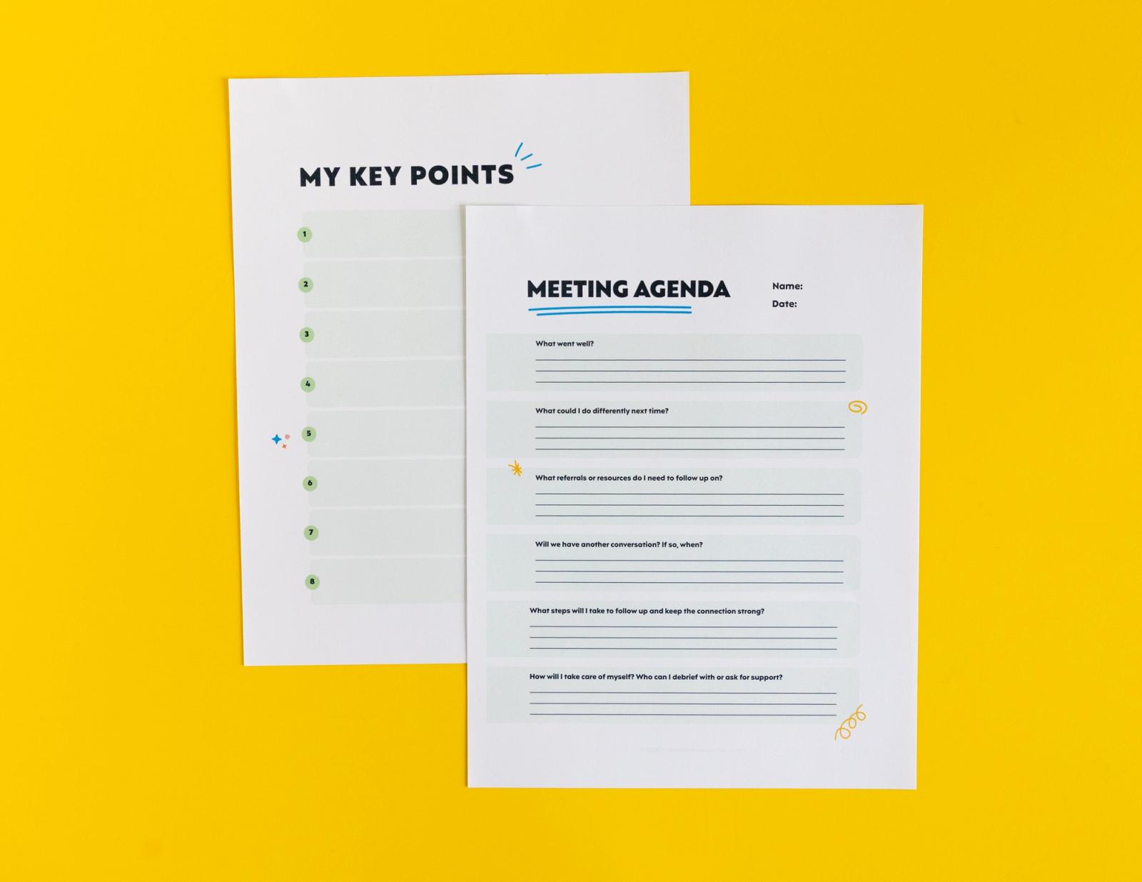 Sheets of paper that say "my key points" and "meeting agenda" lay on a yellow background.