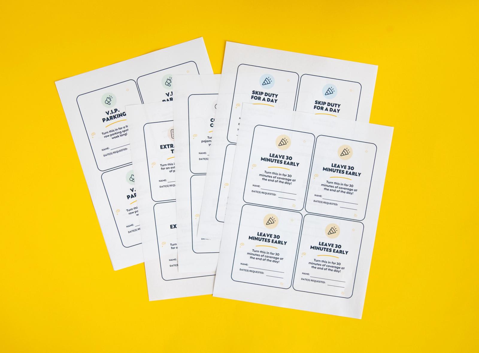 Five sheets of paper lay on a yellow background.