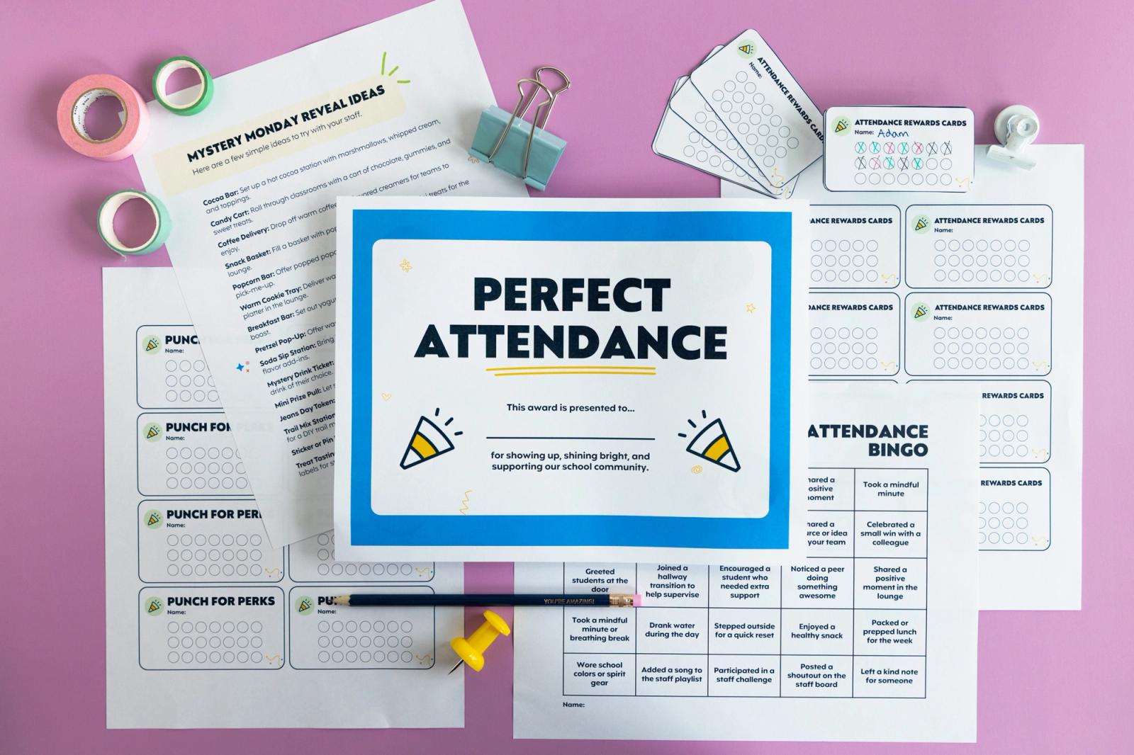 Five pieces of paper lay on a light purple background. The top paper says "perfect attendance."