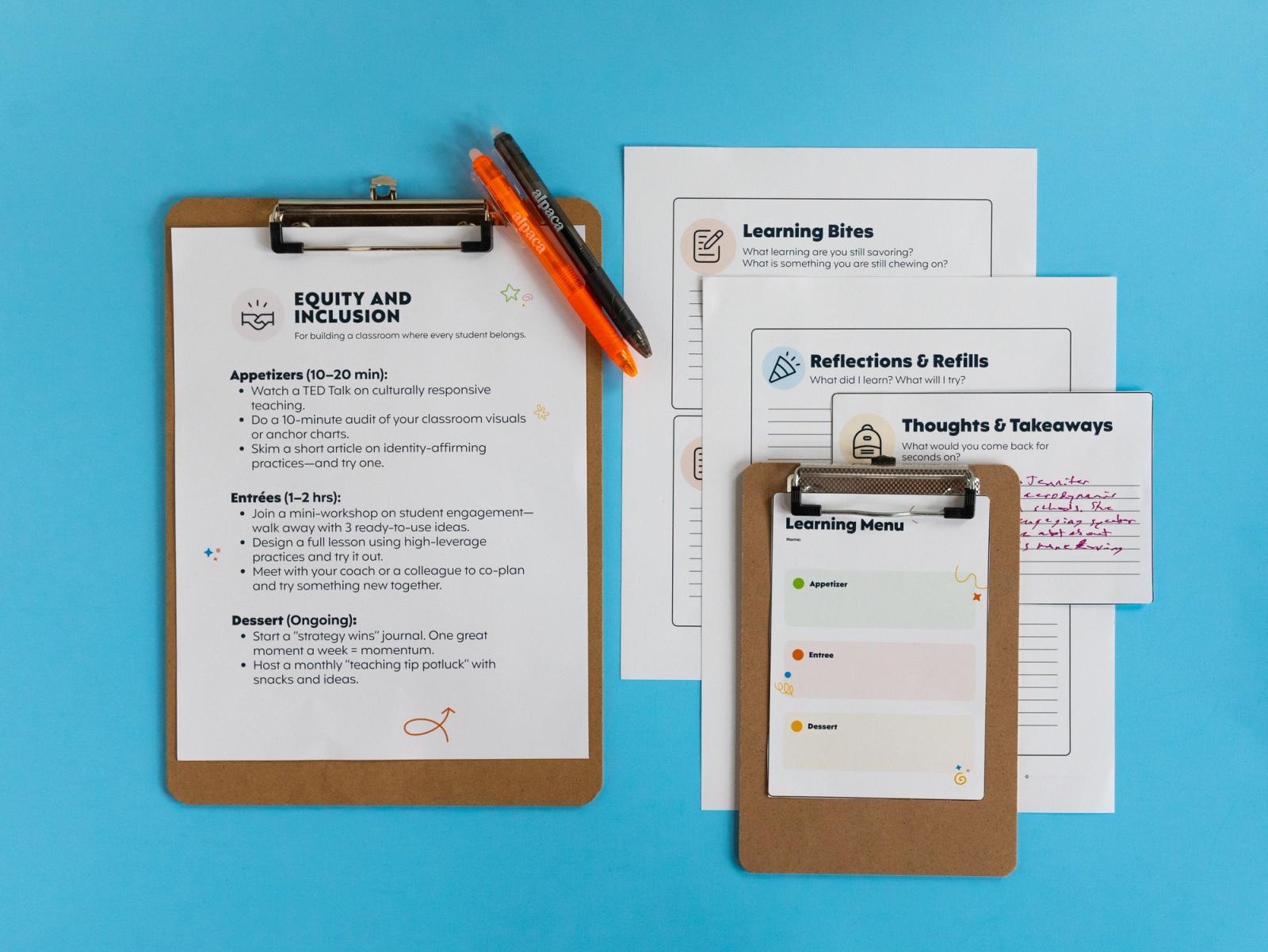 A large clipboard with a piece of paper on it lays on a blue background. Next to it are more papers and a smaller clipboard with a "learning menu" on it.