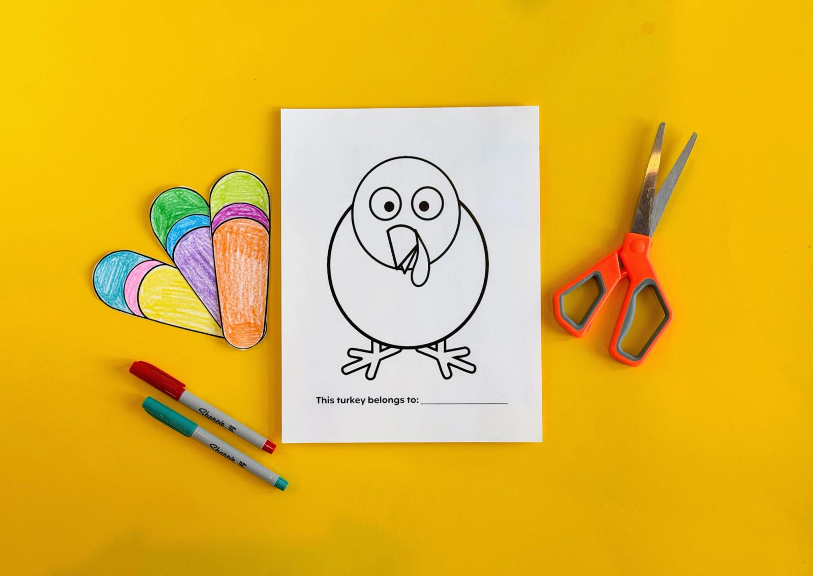 Printable turkey body with a name line next to three colored paper feathers, markers, and scissors for a staff game