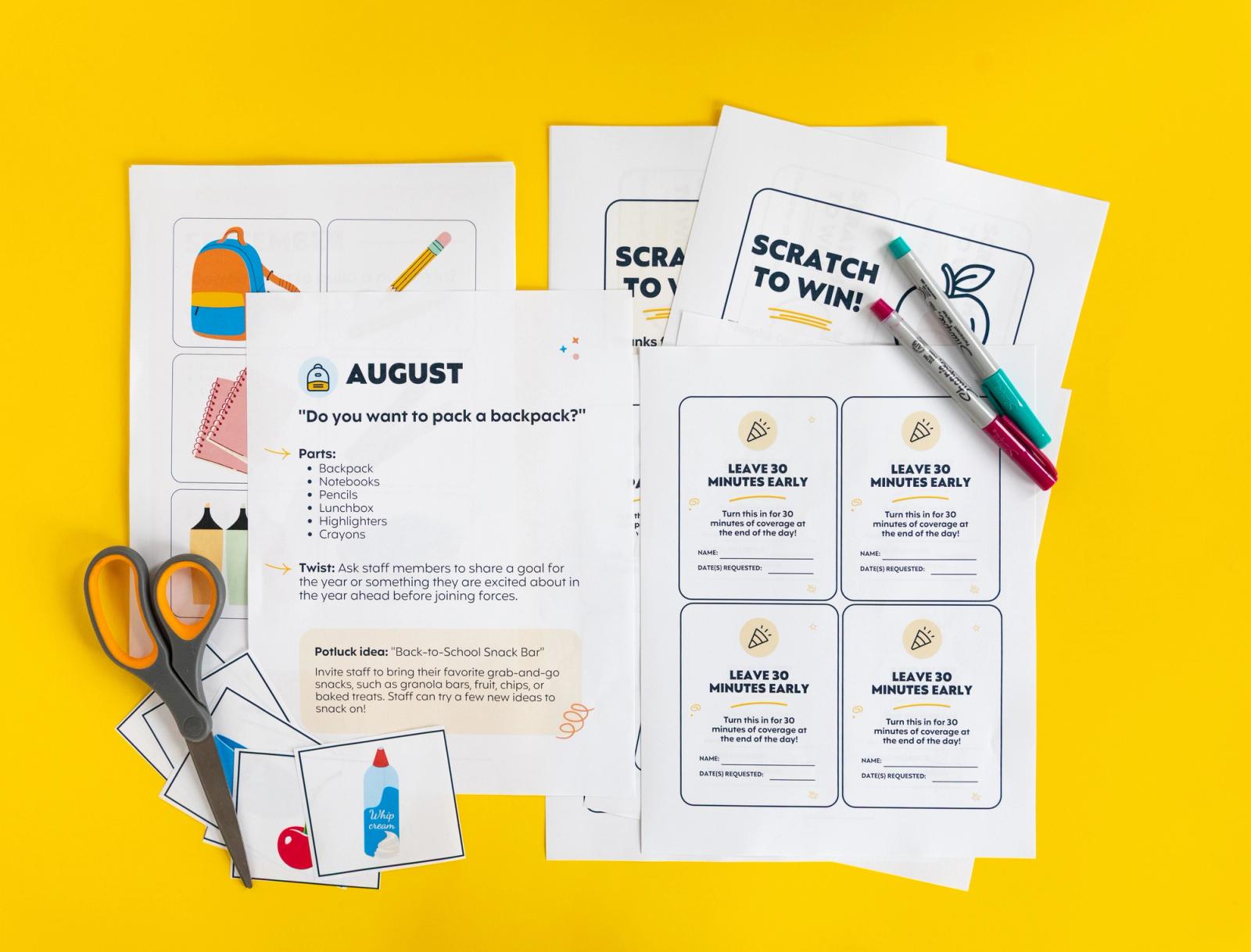 A group of papers, scissors, small pieces of paper with images on them, and markers lay on a yellow background.