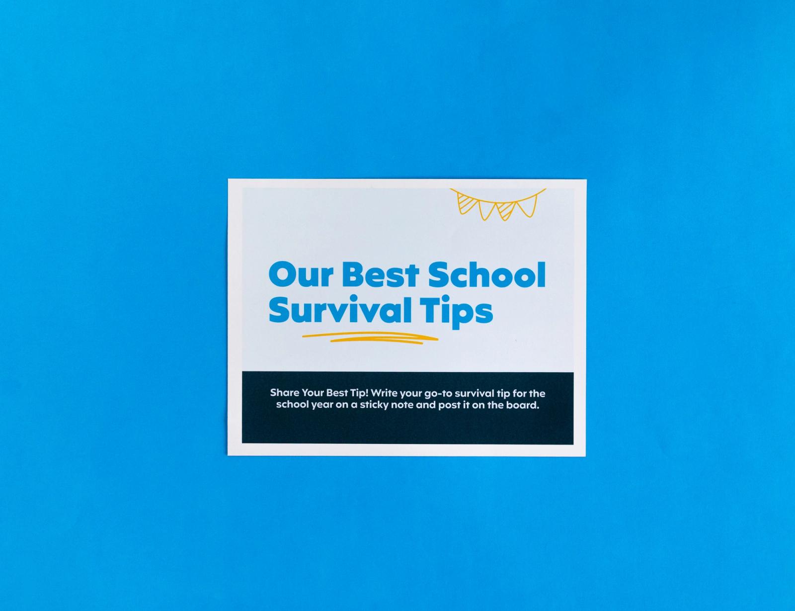 A sheet of paper that says "our best school survival tips" lays on a blue background.
