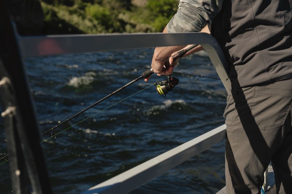 Tournament angler with a smallmouth bass in Hells Canyon
